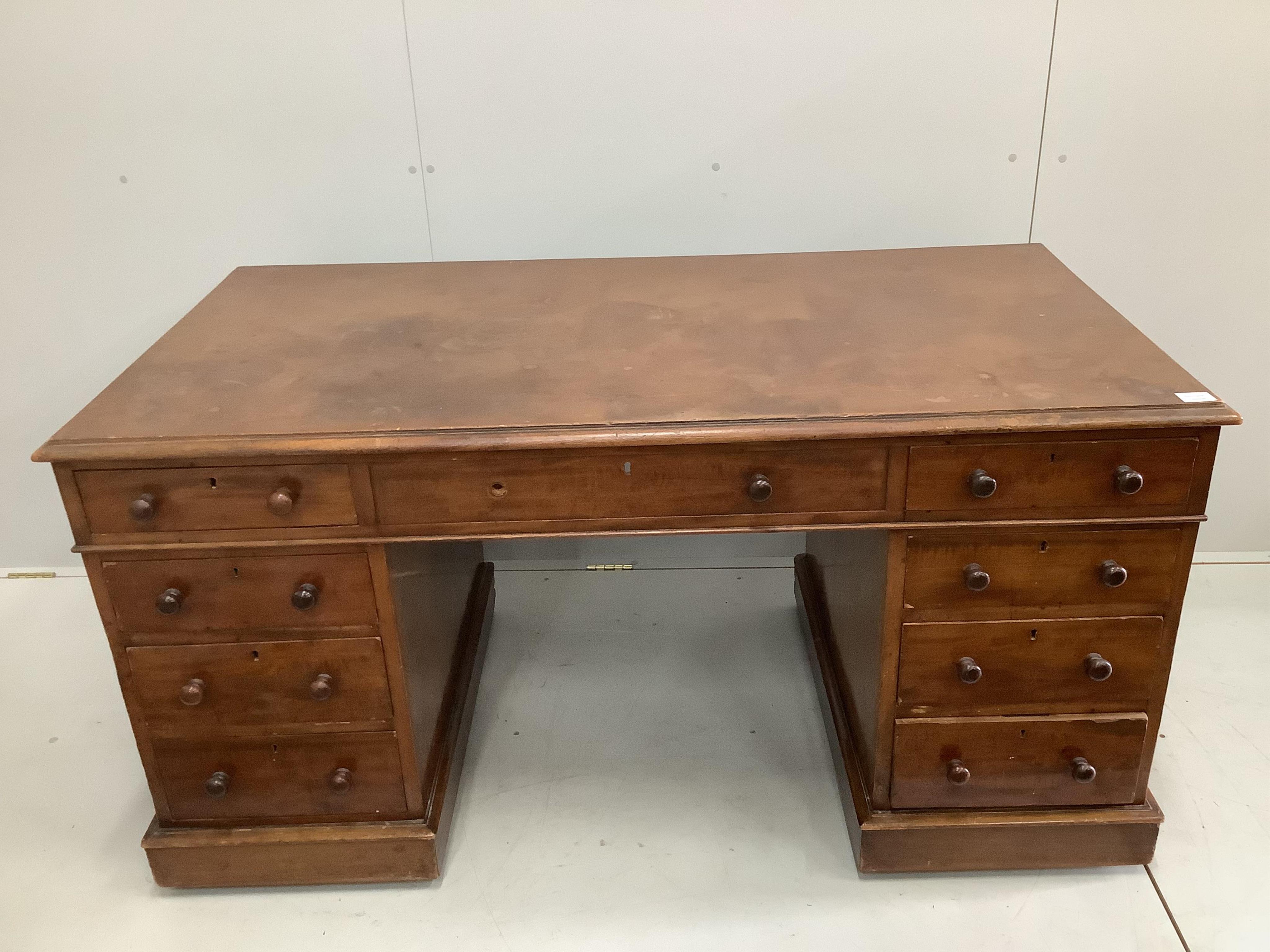 A Victorian mahogany pedestal desk, fitted eight small drawers, boarded top, width 151cm, depth 79cm, height 76cm. Condition - poor